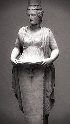 Statue of hermaphroditus lifting her dress
